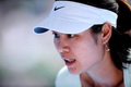 Li Na tampil memukau walau suhu politik memanas