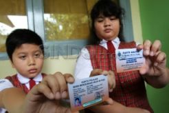 1 Desember kartu pintar dibagikan
