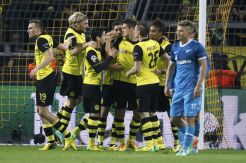 Takluk di kandang, Dortmund tetap lolos