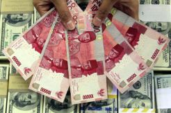 Rupiah Kembali Terjungkal Rp12.000/USD