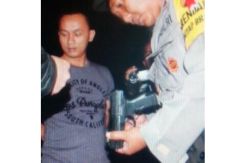 Kedapatan Bawa Senpi dan Miras Pengemudi Mobil Ditangkap