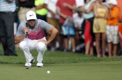 McIlroy Geser Posisi...