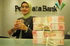 PermataBank Cetak Laba Bersih 2014 Rp1,6 T