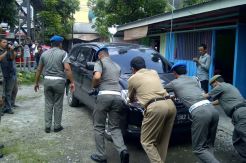 Mobil Dinas Mantan Anggota DPRD Sumut Disita Paksa