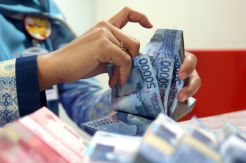 Rupiah Dibuka Membaik...