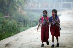 Ini Trik Guru Kejar Pelajaran Karena Libur Akibat Asap