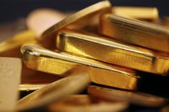 Harga Emas Bersiap di Bawah USD1.000 Dipicu Suku Bunga