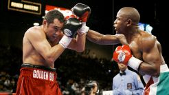 De La Hoya Bantah Tudingan Mayweather Jr Soal Rasisme