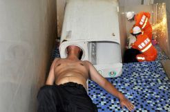 See This Head Stuck in Washing Machine