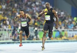 Usain Bolt Pertahankan...