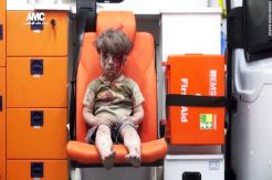 See Bloodied Boy Victim of Airstrike at Aleppo