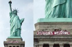 Aktivis Pasang Spanduk Selamat Datang Pengungsi di Patung Liberty