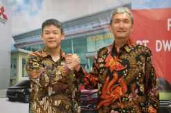 Hisashi Ishimaki Pamitan, Mitsubishi Restrukturisasi Bisnis