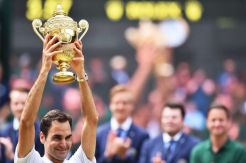 Federer Stands Tallest of Wimbledons History Man