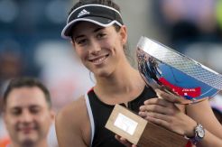 Muguruza Puas Akhiri Musim Lapangan Keras dengan Trofi
