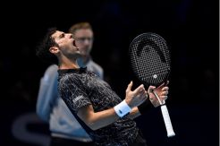 Permainan Solid Djokovic Sudahi Perlawanan Isner di Laga Pembuka