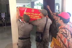 Menunggak Pajak Rp5 Miliar, Hotel di Pangkalan Bun Dipasangi Spanduk