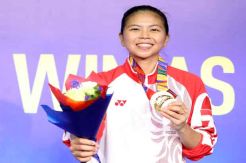 Senyum Greysia Polii...