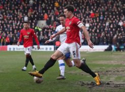 Babak I: Kondisi Lapangan Jelek, Manchester United Cukur Tranmere