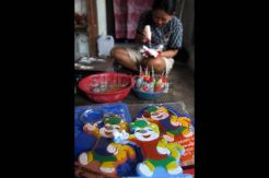 Pembuatan souvenir maskot ISG