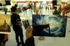 Galang dana bencana lewat penjualan foto