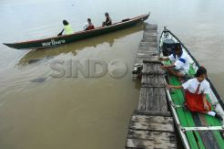 Semangat sekolah dari pinggiran Sungai Musi