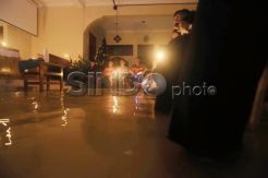 Kebaktian Malam Natal dalam Genangan Banjir