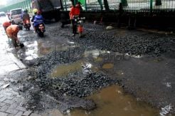 Perbaikan Jalan Rusak Akibat Banjir