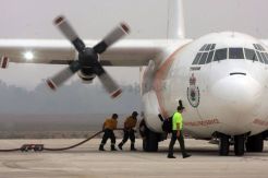 Pesawat Lockheed L100-30 Australia Mulai Padamkan Api