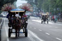 Menikmati Jakarta Lengang dengan Delman Wisata
