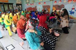 WOM Finance Gelar Seminar KDRT di Kalijodo