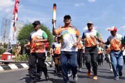 Obor Api ASG XI Diarak Menuju Balai Kota Semarang