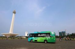 Liburan Seru Keliling Monas Naik Bus Listrik Transjakarta