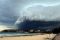 Awan badai lintasi Pantai...