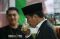 Presiden Jokowi Serahkan...