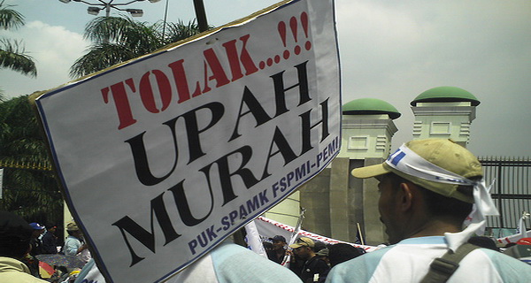 Solusi soal upah, bukan...