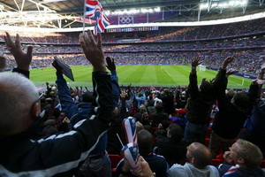 Penonton sepakbola Olimpiade...
