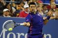Menang mudah, Djokovic...