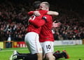 Rooney bawa United perbesar...