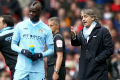 Mancini dan pemain City...