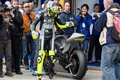 Rossi dibesarkan oleh...