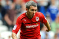 Kevin McNaughton bertahan...