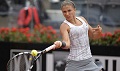 Errani melaju ke perempat...