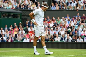 Federer tumbang di babak...