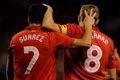 Gerrard coba rayu Suarez...