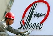 Sinopec akuisisi perusahaan...