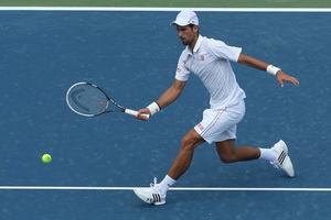 Djokovic lolos ke perempatfinal