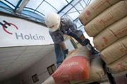 Perluas pasar, Holcim...