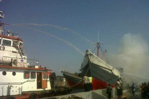 KM Surya Gumilang terbakar...