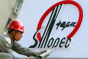 Rosneft-Sinopec sepakati...